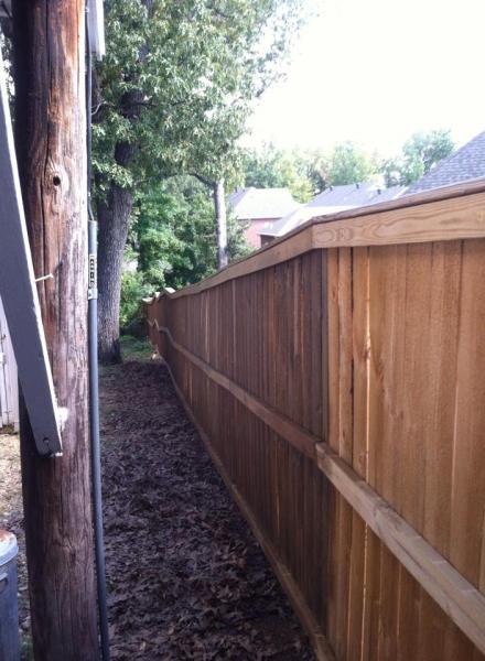 Give the outdoors a fresh look with a new stain for your privacy fence!