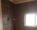 Tile is one of the best and most versatile building materials for use in rooms that get wet, like bathrooms
