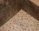 Walk-in showers are great for bathrooms and laundry rooms alike, using tile is perfect for wet areas.